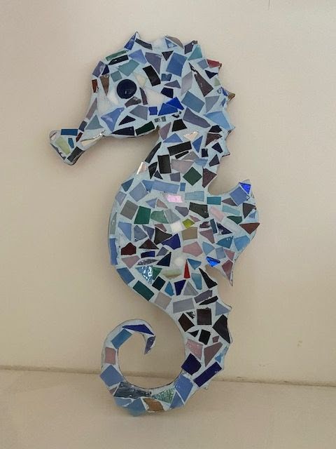 My 7 year old's mosaic of a seahorse